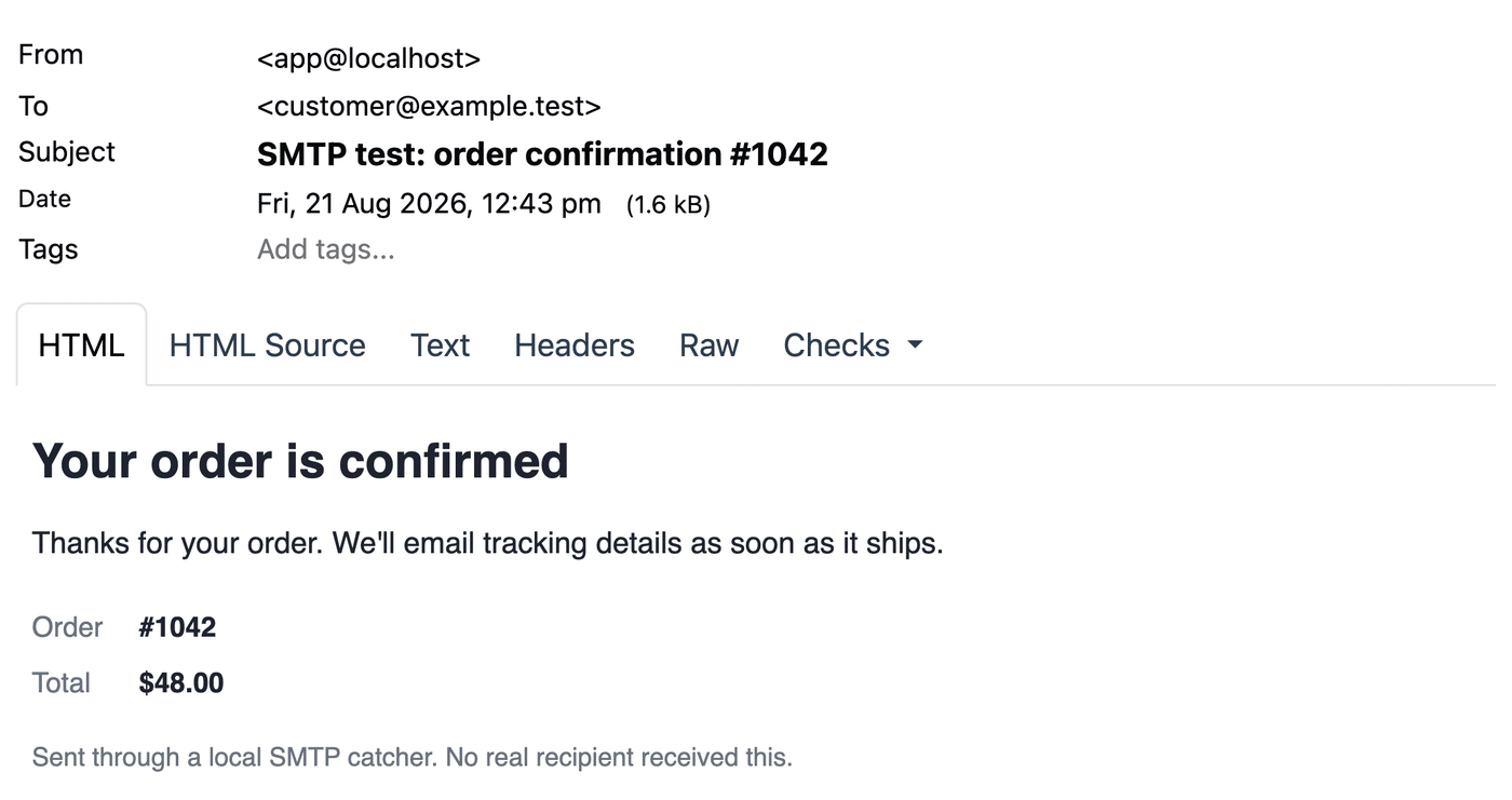 Mailpit showing a captured test email with the HTML preview open